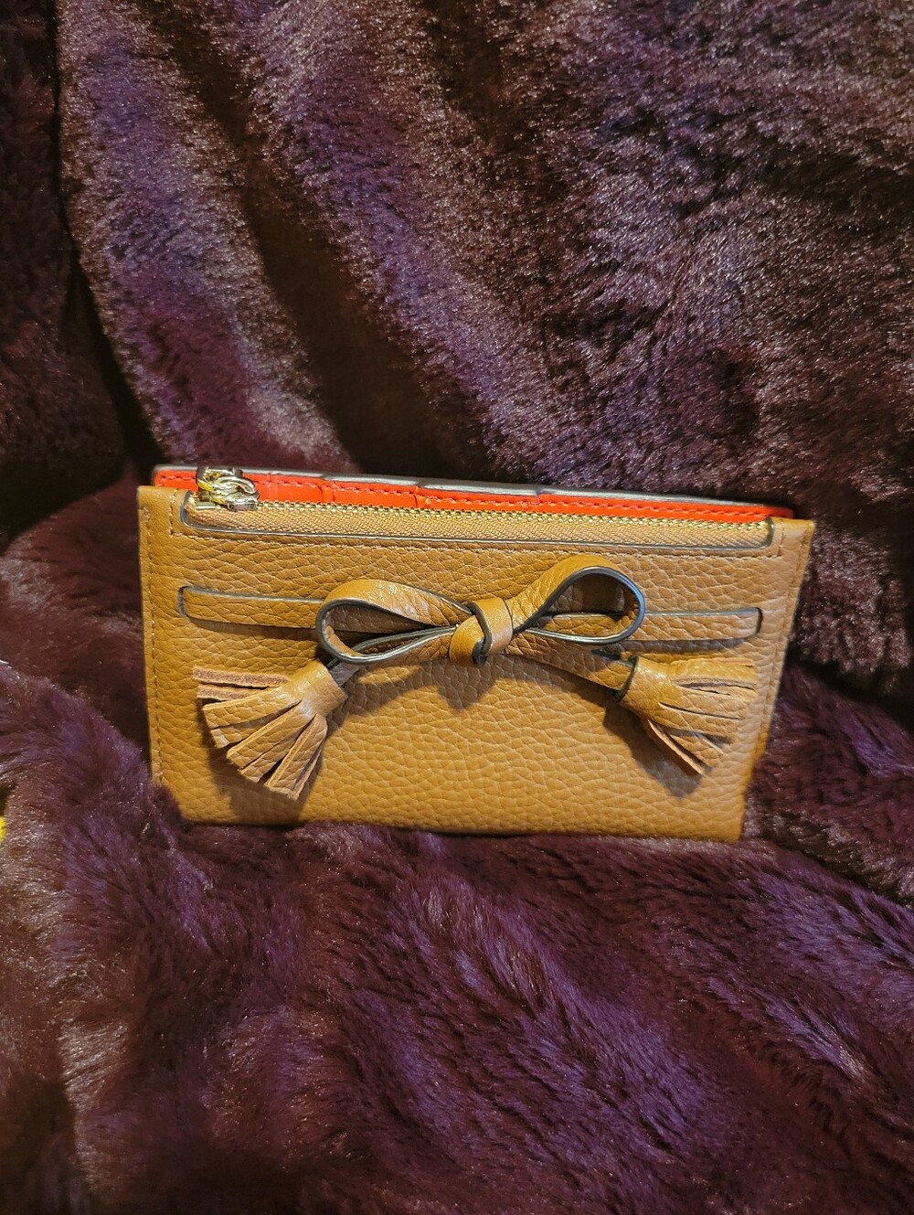 Kate Spade Leather Tassel Bow Zip Wallet in Tan